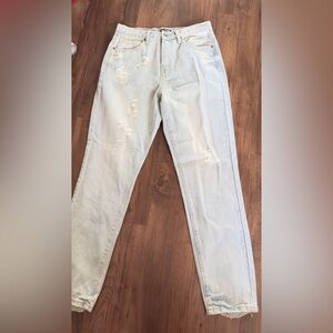 Fashion nova Light Blue Distressed women’s jeans - size 5/27 (small)